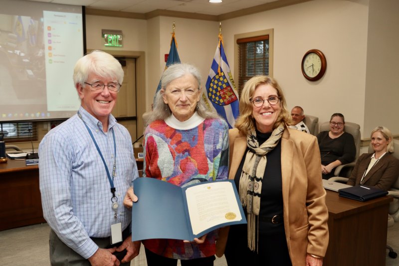 Melanie Moser, center, was recognized for her service and leadership to the Lewes Planning Commission Oct. 13. Moser served on the panel since 2019 and, most recently, served as LPC chair. Shown are (l-r) Tim Ritzert, Lewes city councilman; Moser; and Amy Marasco, Lewes mayor.
